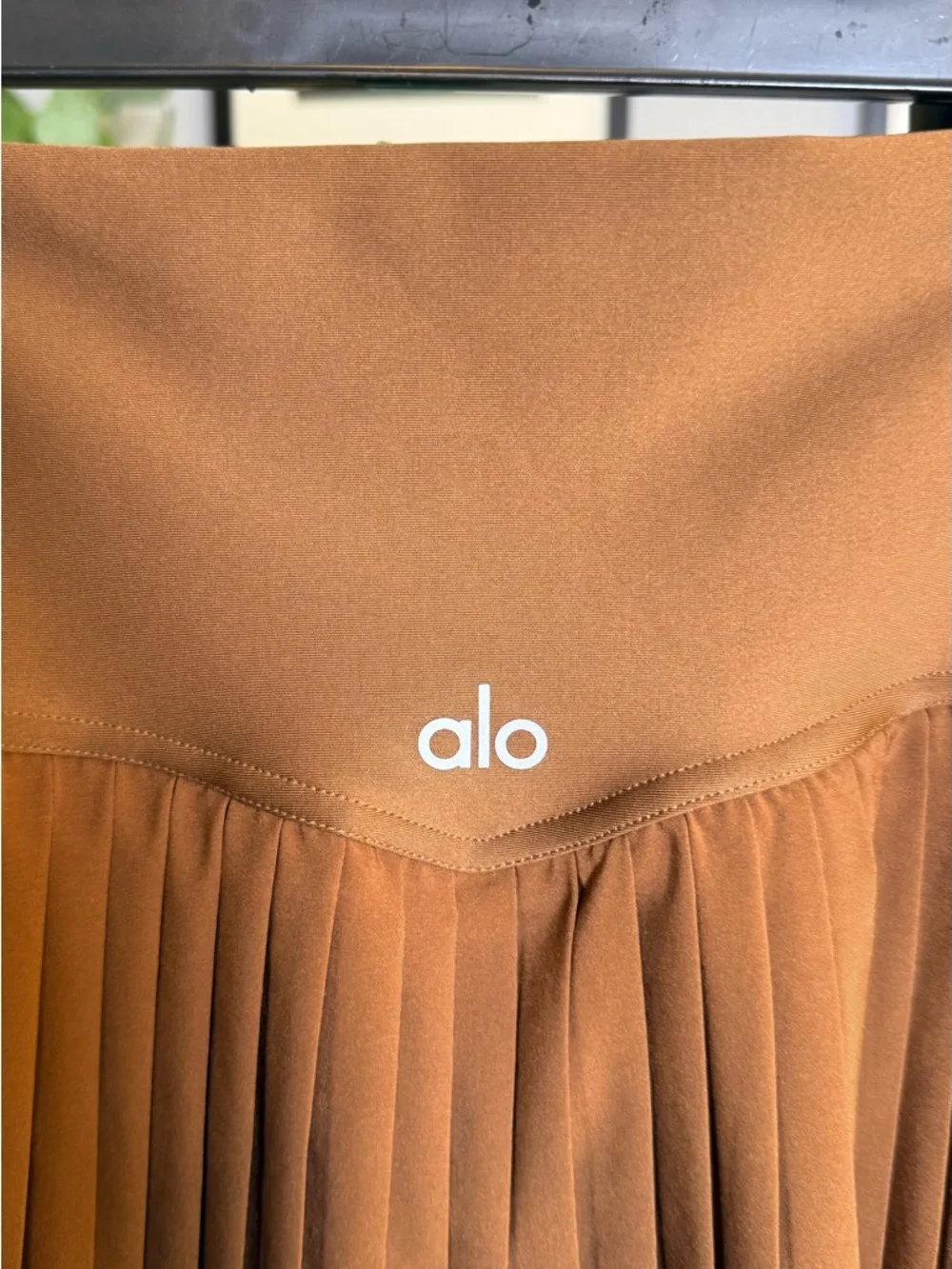 ALO Yoga Pleated Mini Skirt in Rust Brown
